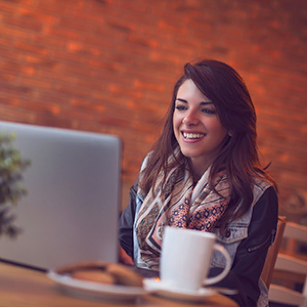 Lady smiling at computer